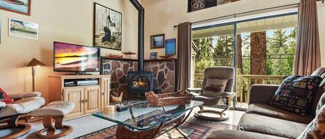 Living room features fireplace and SmartTV