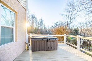 Hot tub located outside on the lower deck