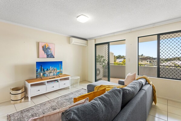 Living Room with balcony access