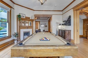 Have a Blast Playing Billiards on Our Amazing Pool Table. It's the Perfect Spot to Chill and Bond.