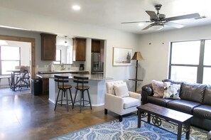 The kitchen is open to the living room. 