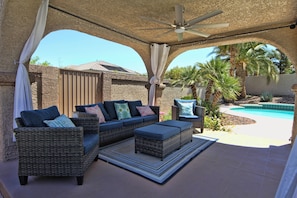 Gazebo Socializing Space. Ceiling fan, sun curtains.