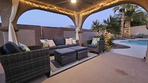 Gazebo outdoor sitting space. Fan, lights. Stay cool! Enjoy! Relax!