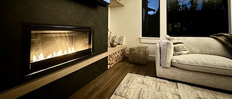 Living room with gas fireplace.