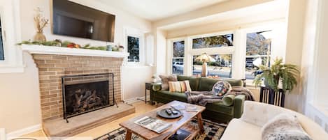 Cozy living room with gas fireplace and streaming tv.