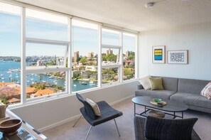 The living area contains a sofa bed. 