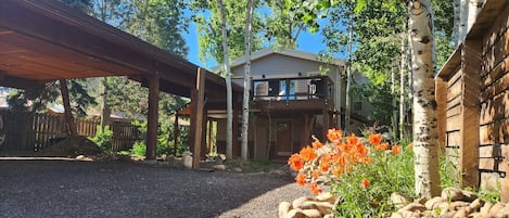 We offer a large, private backyard in the Aspen trees.