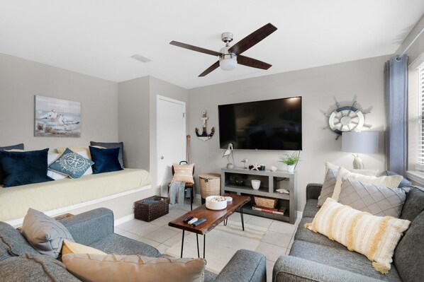 Living Room with ample seating and built in daybed 