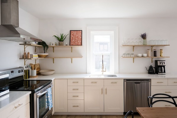 Bright and airy kitchen. You'll enjoy cooking here - although we do highly recommend the local restaurants! Reach out for recommendations.