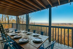 Enjoy outdoor dining while taking in the expansive views. 
