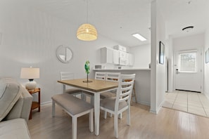 Dining area for 6 plus 3 additional stools at the bar top counter.