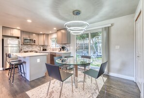 Another view of the kitchen and dining area