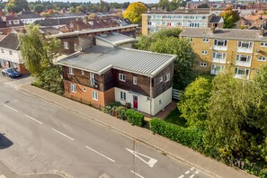 Aerial view of the property and the neighborhood