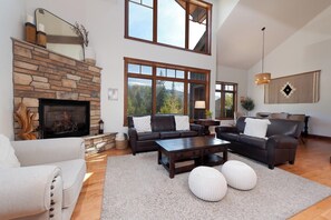 Main Living/Dining Spaces - TV, Gas Fireplace, Deck and views