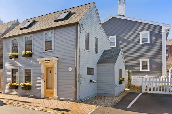 Front entrance. You have 2 off-street parking spots to the right of the property.