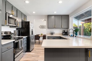 Expansive & Fully Stocked Kitchen