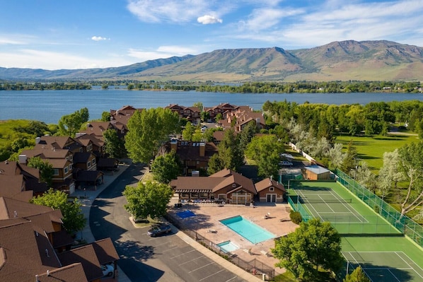 Aerial view of Lakeside Village, showing the Community Pool, Hot Tub and Pineview Reservoir in the background.