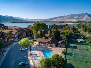 Ariel view of Lakeside Village tennis courts, pool, and hot tub.