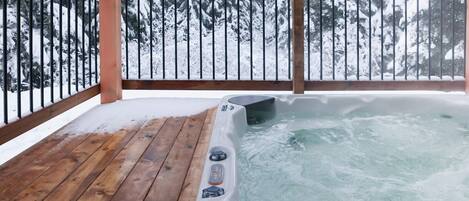 Covered hot tub for up to 8 with mountain views