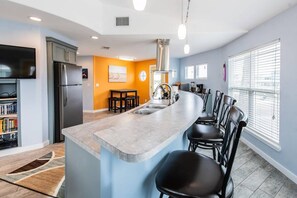 Bar seating with an open kitchen