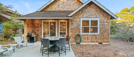 New home with private back yard including fire pit and patio area