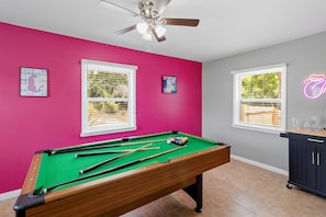Enjoy a game of pool in the first floor game room.