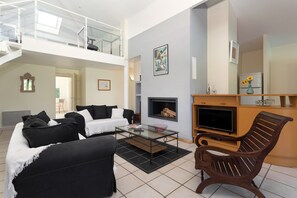 Relax and rejuvenate in the gorgeous living room of our villa for 12!