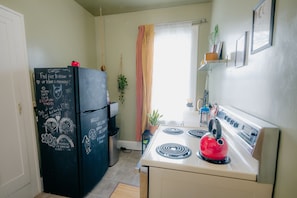 Kitchen with chalkboard refrigerator.  Come show us your artwork!