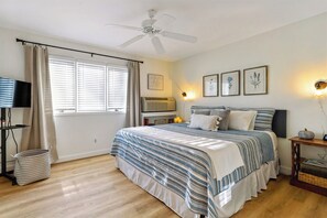 King bed with luxury sheets.  Portable smart TV.