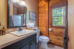 DOWNSTAIRS BATHROOM - Stand-up shower and toilet w/bidet.