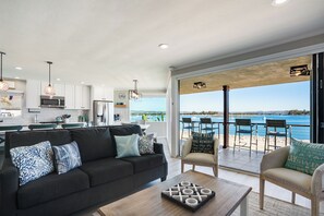 Bright and spacious open-plan living space with contemporary seating.