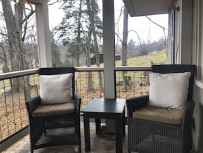 Front porch looks over at horses, Old Rag and across fields to mountians