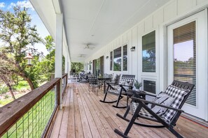 Savor your favorite beverage and the views from the covered porch