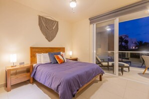 Bedroom 1 with direct access to the private balcony