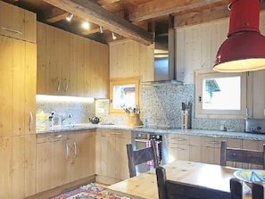 Kitchen with open-plan dining area