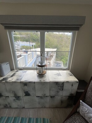 Storage, coffee maker, mini fridge, microwave, and limited kicthen supplies