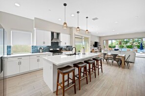 A sleek kitchen with a spacious island