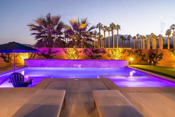 Elegant poolside retreat with stunning mountain views.
