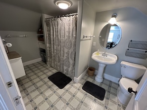 Upstairs full bathroom with sink and vanity