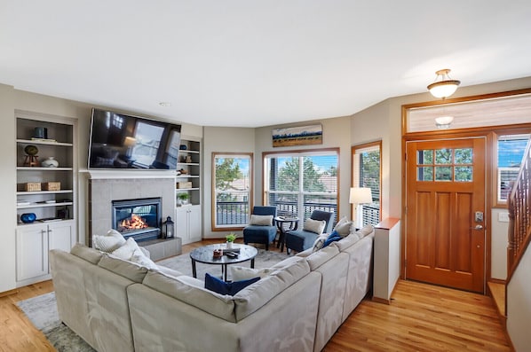 Sink into the plush comfort of the cozy couch while enjoying your favorite shows