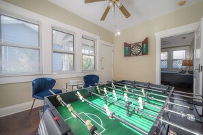 Dedicated game room with foosball, darts and more!
