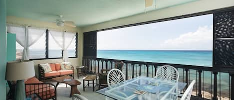 Just outside of this expansive window from the condo is the Caribbean!