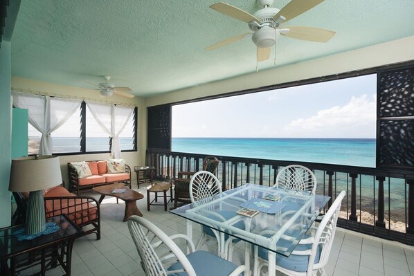 Just outside of this expansive window from the condo is the Caribbean!