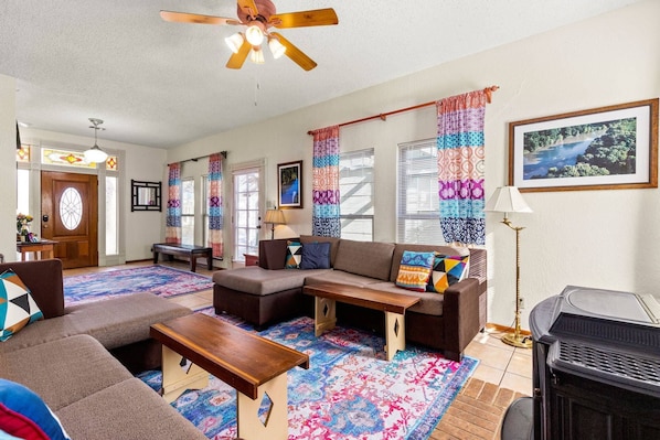 Beautiful stained-glass transom casts a warm glow on this downtown New Braunfels vacation rental.