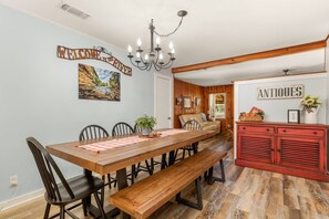 Gather around this inviting farmhouse-style dining table, perfect for creating memorable meals and moments with family and friends.