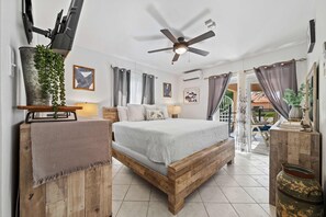 Sophisticated Bedroom of the 2BR Home in Noord Aruba - Comfy King size bed - Smart TV and Netflix - Easy Access to outdoor area