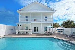 One of the largest private pools in the heart of Destin, plus a outdoor kitchen!