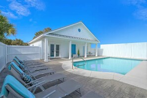 Fenced pool with outdoor dining and grilling area is perfect for all to gather!