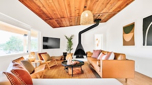 Brand new living room with a sofa bed. You'll find plenty of games and instrumnt
