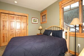 Relax on one of the comfy beds after a day in the mountains. Bedding configurations vary!
